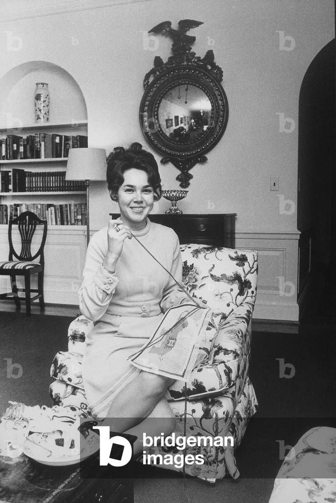 First Daughter, Eisenhower crafting a needle point of a Republican Elephant in the family quarters of the White House. c. 1970
