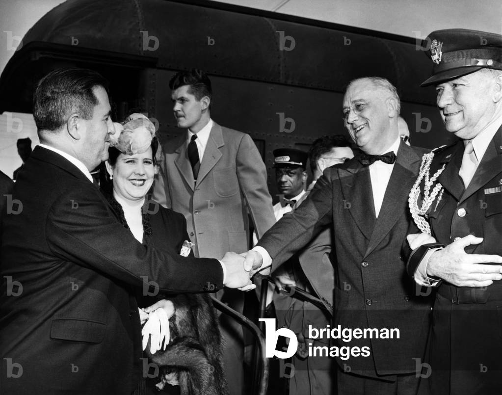 FDR Presidency. From left: Mexican President Manuel Avila Camacho and wife Soledad Orozco Camacho greet US President Franklin Delano Roosevelt and US Major General Edwin Watson at Monterrey, Mexico, 1943