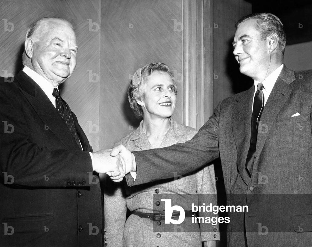 Former president Herbert Hoover with his son, Herbert Jr. and his wife, July 21, 1955