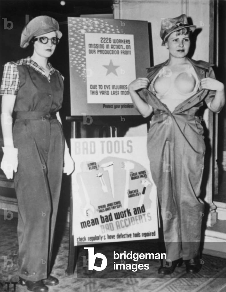SAF-T-BRA' for women war workers at Marinship Corporation. Underneath the uniform at left, is a protective plastic 'bra' modeled on the right. Los Angeles, California during World War 2, c. 1942-45