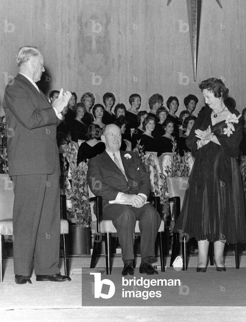 US Ambassador to the United Nations Adlai Stevenson (center) receiving a standing ovation following his speech on the 16th anniversay of the UN to the San Francisco chapter of the American Association for the United Nations. Foreground left: Association chairman George Killion; right: co-chairman Clara (Mrs. Adolph) Shirpser, October 25, 1961