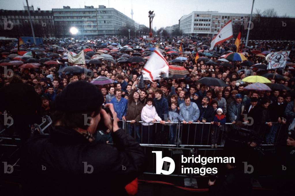 East Germans brave the weather for the official opening of the Brandenburg Gate. Dec. 22 1989