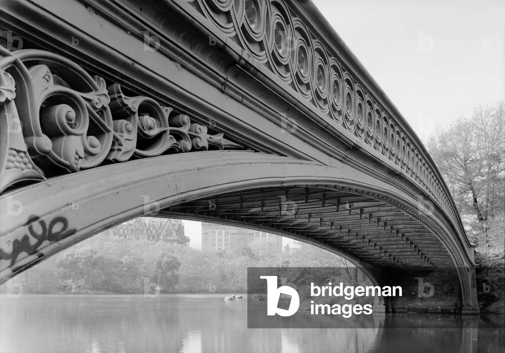 New York City, Central Park's Bow Bridge, view showing underside of arch, the Dakota Apartment building is visible to the left, photograph by Jet Lowe, c.1980s
