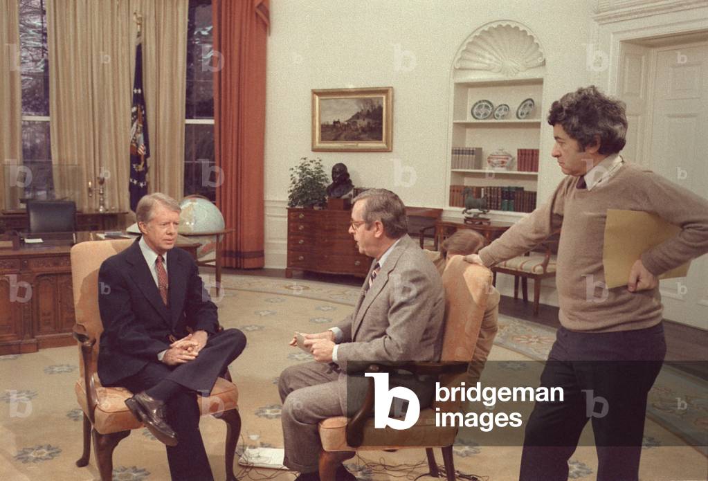 Jimmy Carter prepares for an interview with NBC Anchor John Chancellor while Gerald Rafshoon stands by. c. 1977-1980