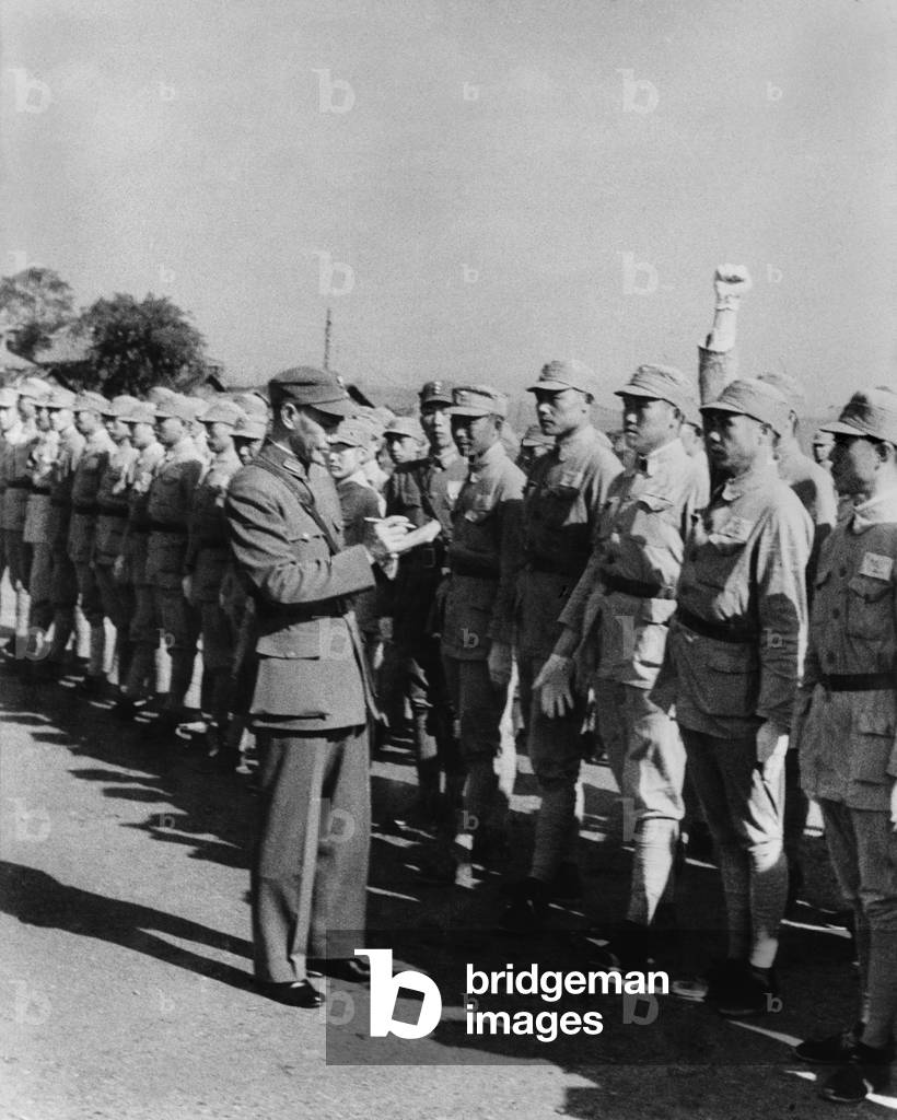 Chiang Kai-shek, political and military leader of China, inspecting army cadets in Chungking. Second Sino-Japanese War/ World War 2. c. 1937-45