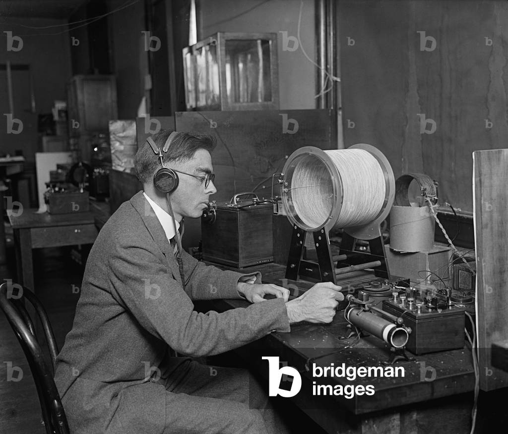 Scientist at the U.S. Bureau of Standards, measuring radio wavelengths to regulate the new phenomena of commercial radio broadcasting. 1925