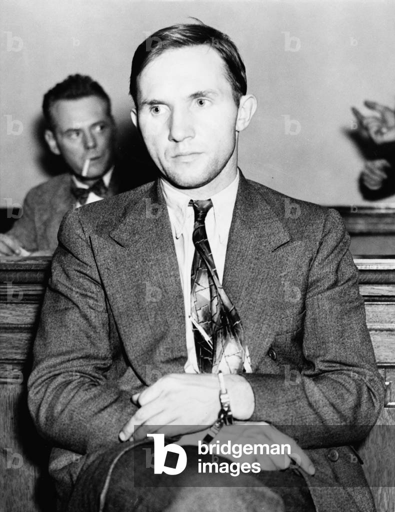 Bruno Richard Hauptmann (1899-1936) in police custody after being questioned in connection with the Lindbergh baby kidnapping. He was convicted and executed for the crime