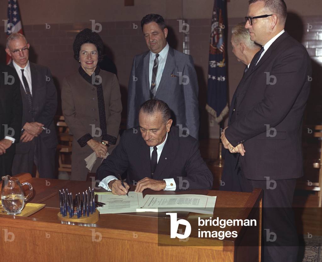 LBJ's Great Society programs. President Lyndon Johnson signing of the Higher Education Act of 1965 at Southwest Texas State College, where he attended college in the 1920s