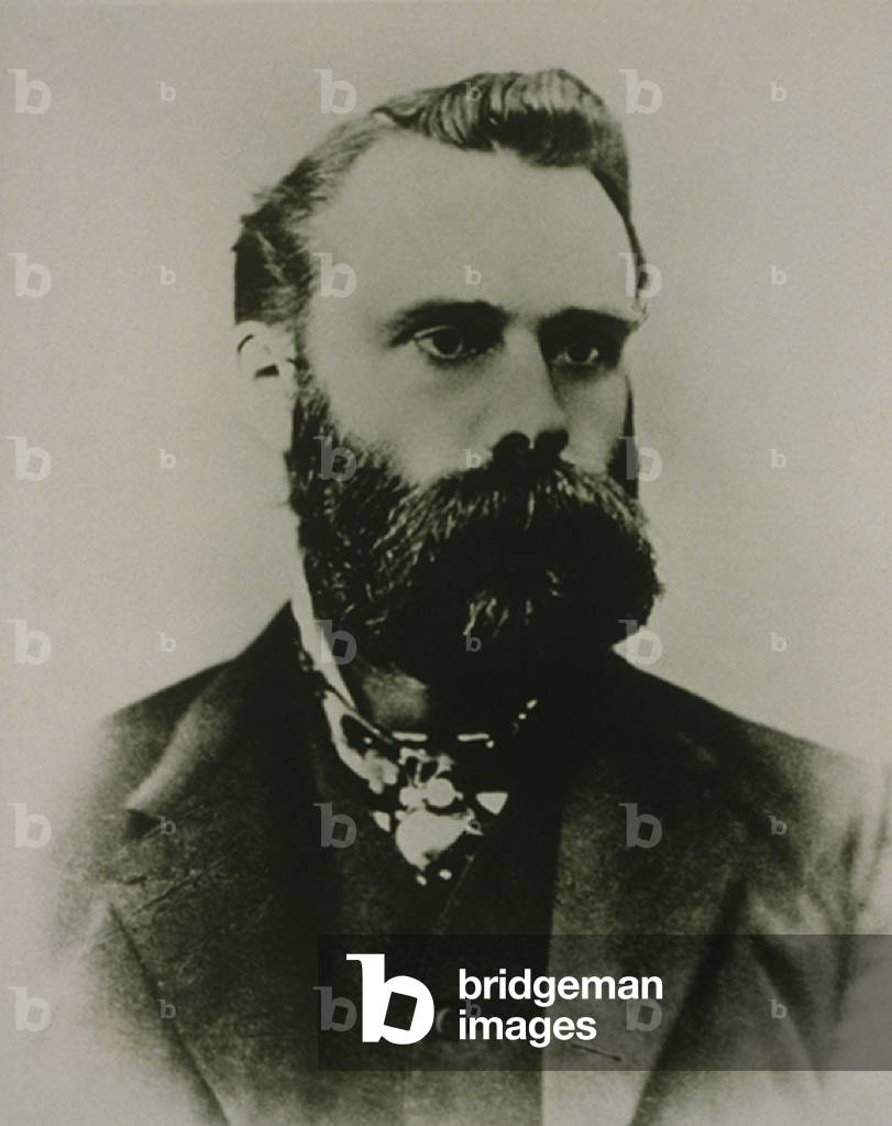 Charles H. Dow (1851-1902), a founder of Dow Jones & Co. who invented the famous Dow Jones Industrial Average in 1896. While also named after his partner, Edward Jones, Dow was the index's sole creator. c. 1900
