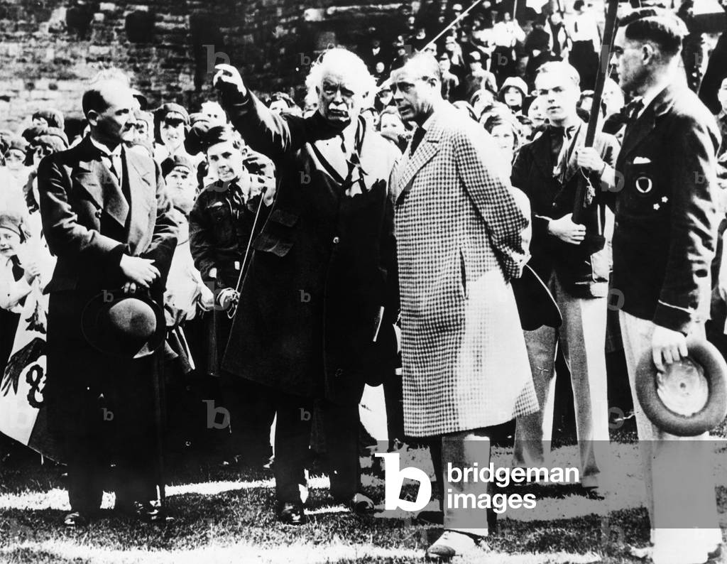 British Royalty. Center: former Prime Minister of England David Lloyd George and Prince Edward of Wales (future Duke of Windsor), 1934