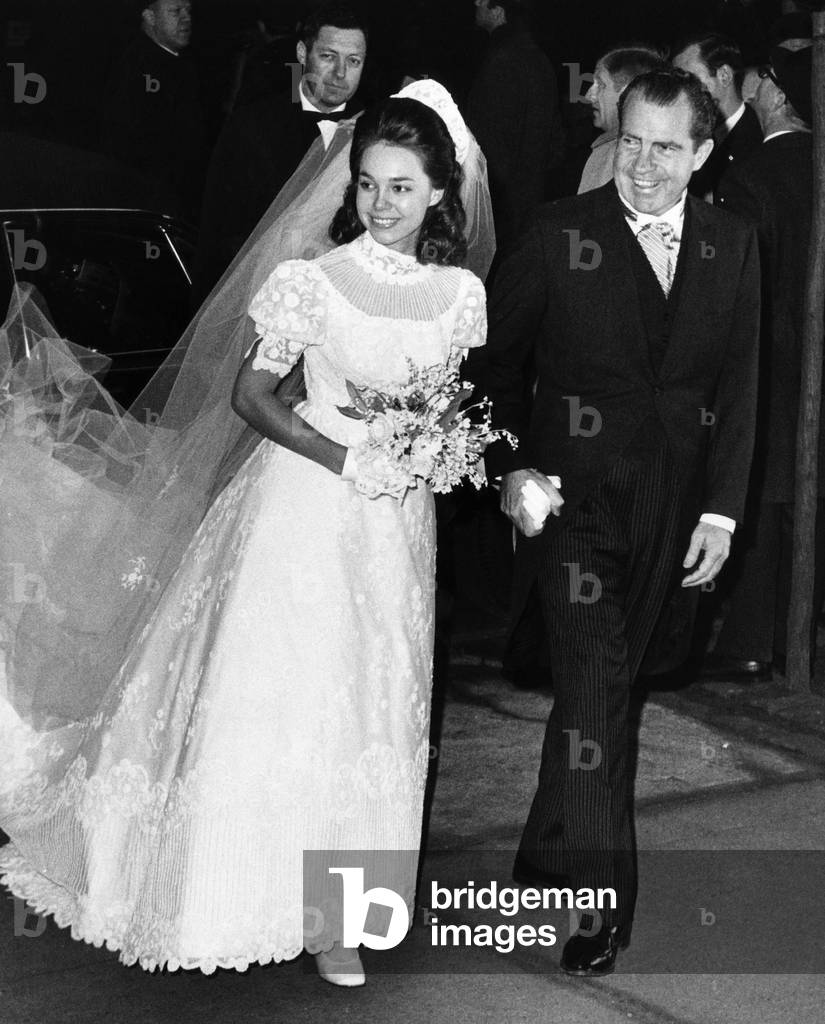 U.S. President-elect Richard Nixon (right,) escorting his daughter Julie Nixon into Marble Collegiate Church for her wedding to David Eisenhower, New York, December 22, 1968.