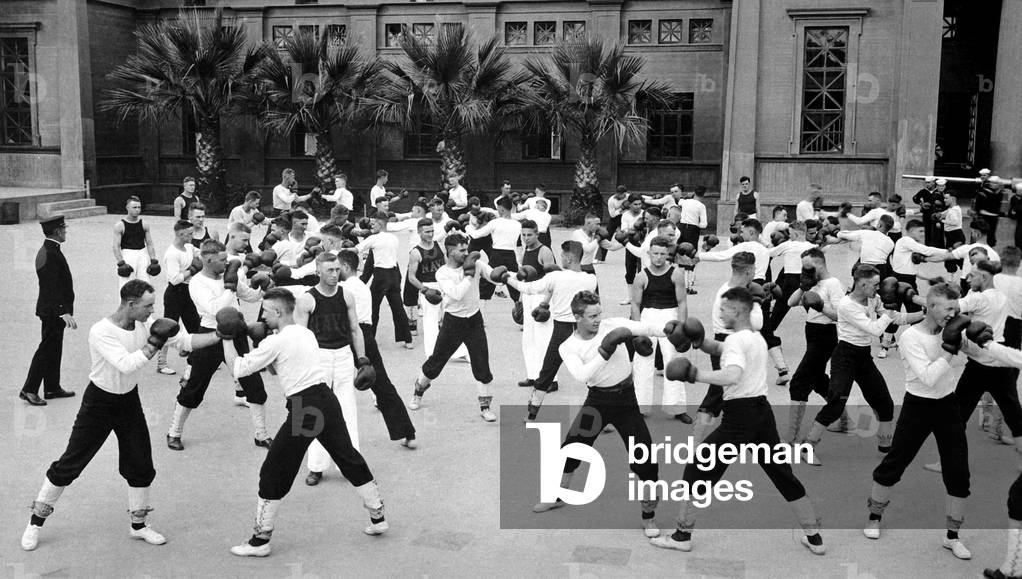 U.S. Naval recruits in boxing instructions at the main barracks, Naval Training Station, San Francisco. World War I. c. 1918