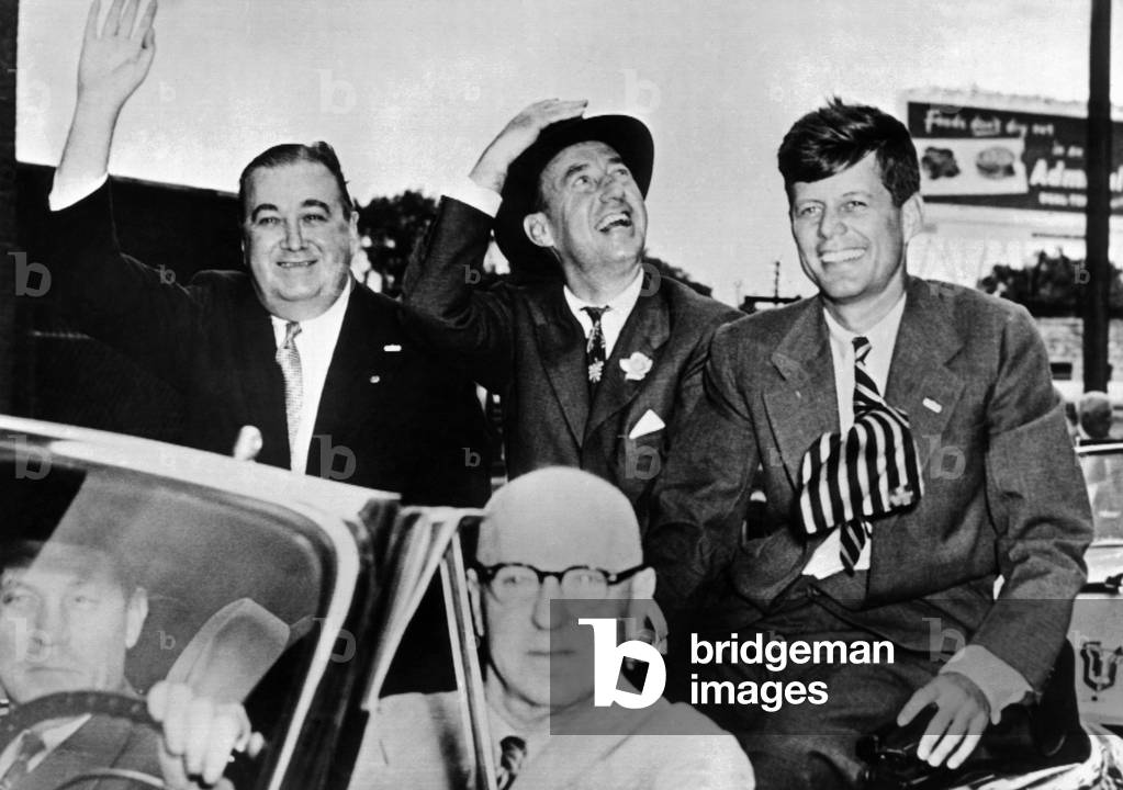 Adlai Stevenson campaigning in Springfield, Massachusetts. With him is Congressman John Kennedy who was campaigning for the Senate. At left is Gov. Paul Dever. Sept. 13, 1952