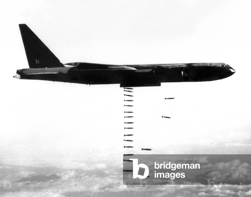 Vietnam War, B-52 Stratofortress (from the Third Air Division's 4133rd Bombardment Wing) releasing a 'bomb train' over targets in Vietnam, 03/31/67