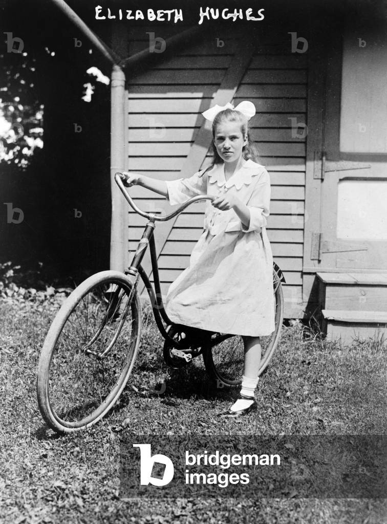 Elizabeth Hughes, with bicycle. c. 1915-1925