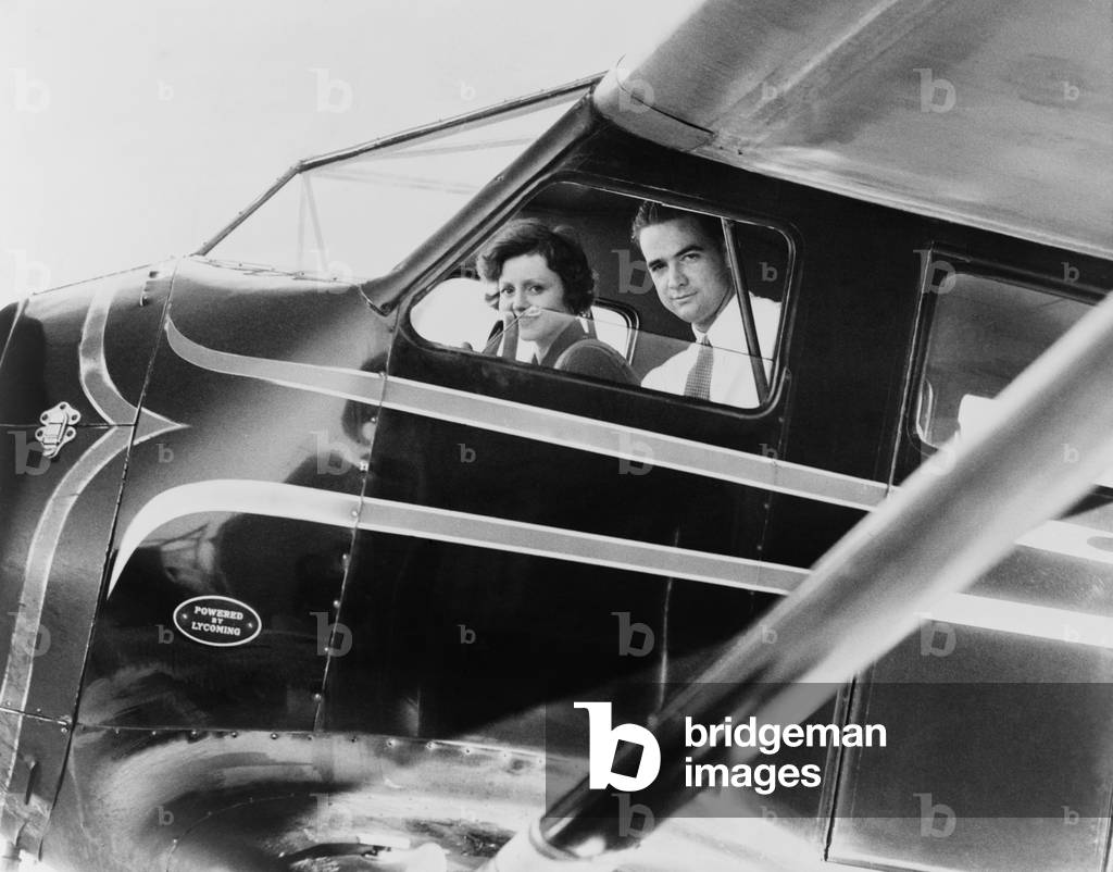 Howard Hughes and actress Nancy Carroll just before taking off for Los Angeles, 1937. Carroll was a A-list actress from 1927 to the mid-1930s, but retired from films in 1938
