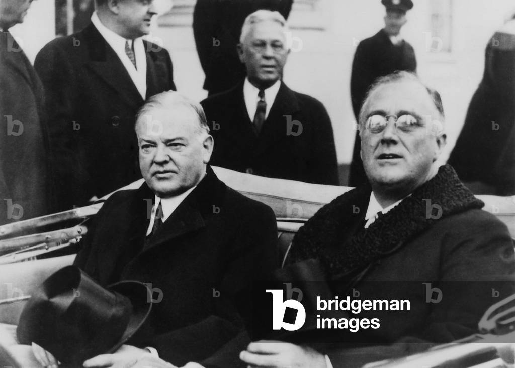 Presidents Franklin D. Roosevelt and Hoover riding to FDR inauguration. Mar. 4, 1933. FDR's refusal to endorse Hoover's Interregnum policies embittered Hoover who refused to talk to FDR during the inaugural procession
