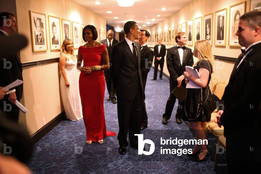 President Obama and Michelle Obama wait at the Washington Hilton Hotel in moments before taking the stage at the White House Correspondents Association dinner. May 1 2010.,