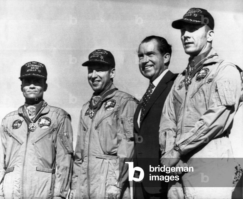 Nixon Presidency. US President Richard Nixon poses with the Apollo 13 astronauts as they receive the Medal of Freedom. From left: Fred Haise, James Lovell, Nixon, John Swigert, Honolulu, Hawaii, 1970