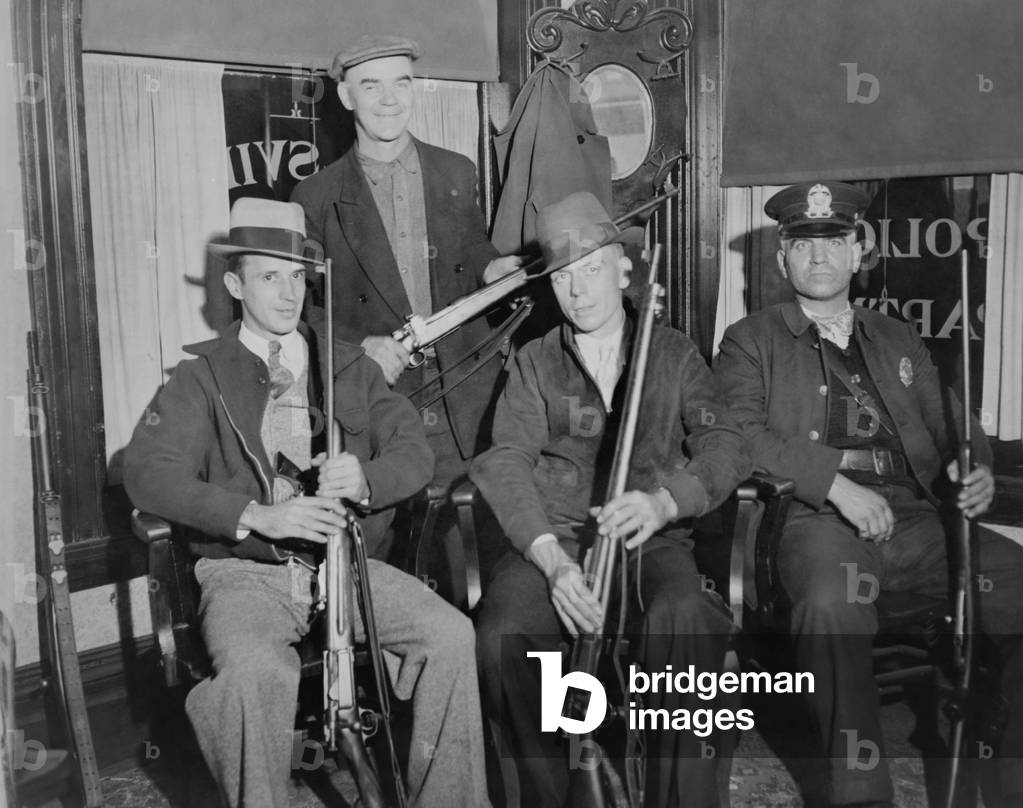 Posse from Wellsville, Ohio, ready to hunt for 'Pretty Boy' Floyd in October 1934. The FBI's Public Enemy No. 1, was killed on Oct. 22, near Clarkson, Ohio, while being pursued by local law officers and FBI agents.