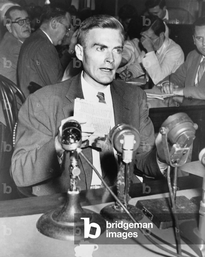 William Remington, testifying at a Senate investigation of communists in U.S. government in 1948. When he learned confessed spy Elizabeth Bentley accused him of giving her with U.S. secrets, he turned informer. He was later convicted of perjury for denying Bentley's accusations