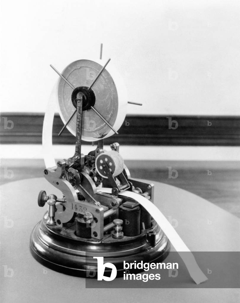 Stock ticker of the late 19th and early 20th century. Early versions of stock tickers provided the first mechanical means of conveying stock prices over long distance over telegraph