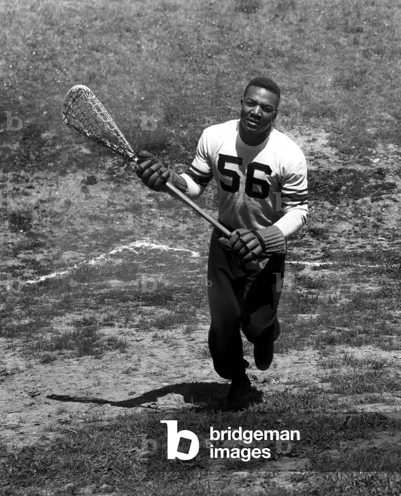 Jim Brown plays lacrosse for Syracuse University, 1957