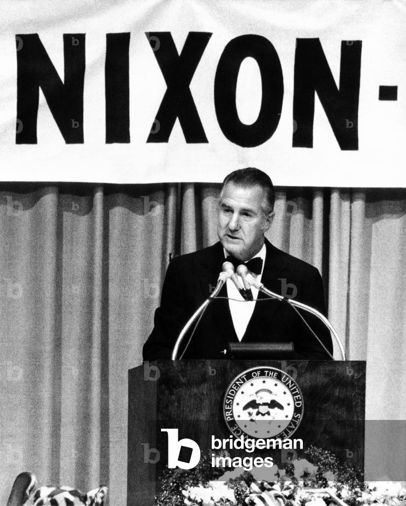 Spiro Agnew speaking in front of a large Nixon sign, June, 29, 1972