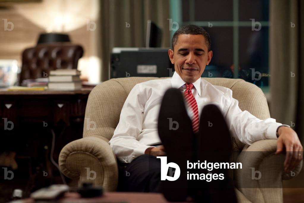 President Barack Obama using his BlackBerry in the Treaty Room office in the private residence of the White House March 21 2010.,
