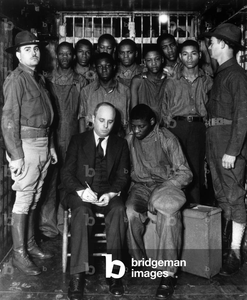 Attorney Sam Liebowitz (seated left) with his clients the Scottsboro Boys in Alabama in the 1930s