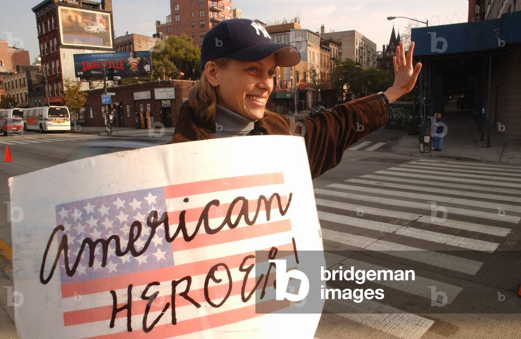 Well wishers demonstrate their support for recovery workers near the site of the World Trade Center, Oct. 20 2001