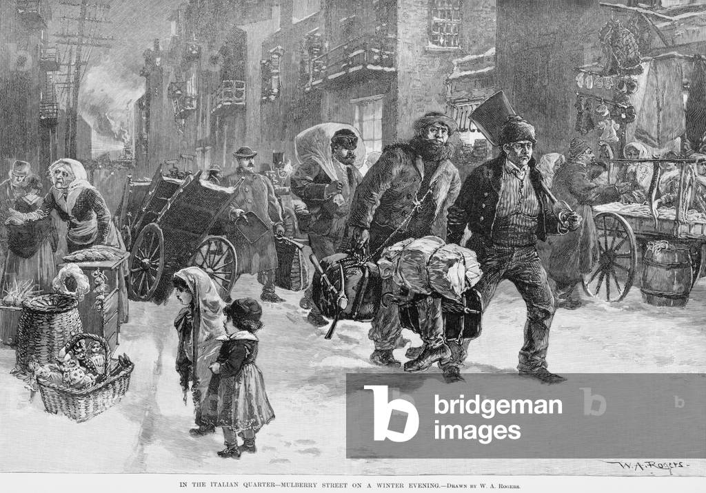 Homeward bound working men carrying their shovels and axes, on a winter evening on Mulberry Street, the Italian quarter of New York City, 1890