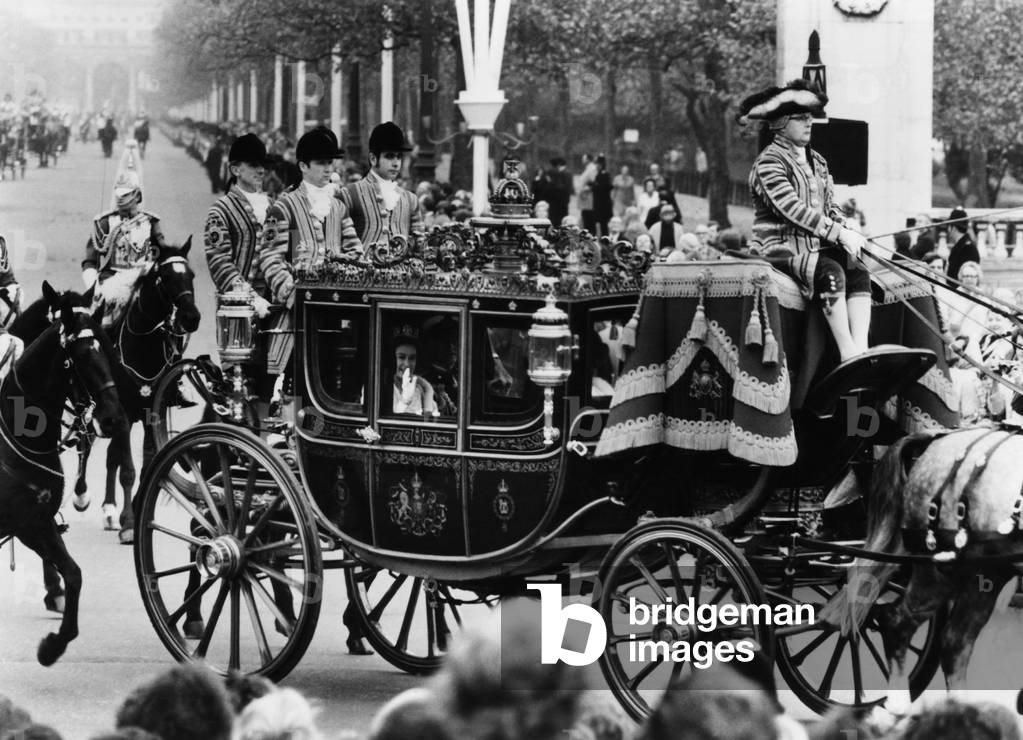 British Royalty. In carriage, from left: Queen Elizabeth II of England and Duke of Edinburgh Prince Philip, during the Queen's Silver Jubilee, London, England, 1977