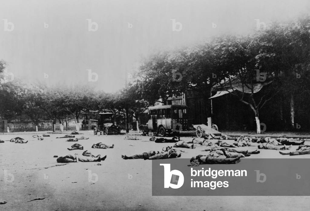 Bodies of Chinese Communists lie on a street in Guangzhou, China, c. 1927-8. At the beginning of the Civil War, they were killed by the Nationalists, as fighting escalated against the Communists led by Mao Zedong