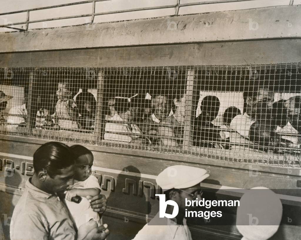 Jewish bus traveling between villages in Palestine, 1937 (b/w photo)