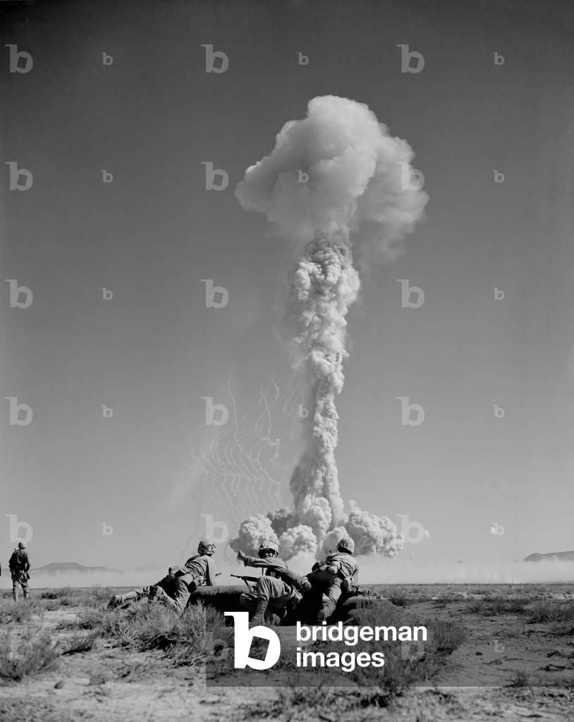 US Marines in battle exercises during atomic bomb testing. Over 2,000 soldiers participated in BEE Shot on March 22, 1955 at Yucca Flat, Nevada