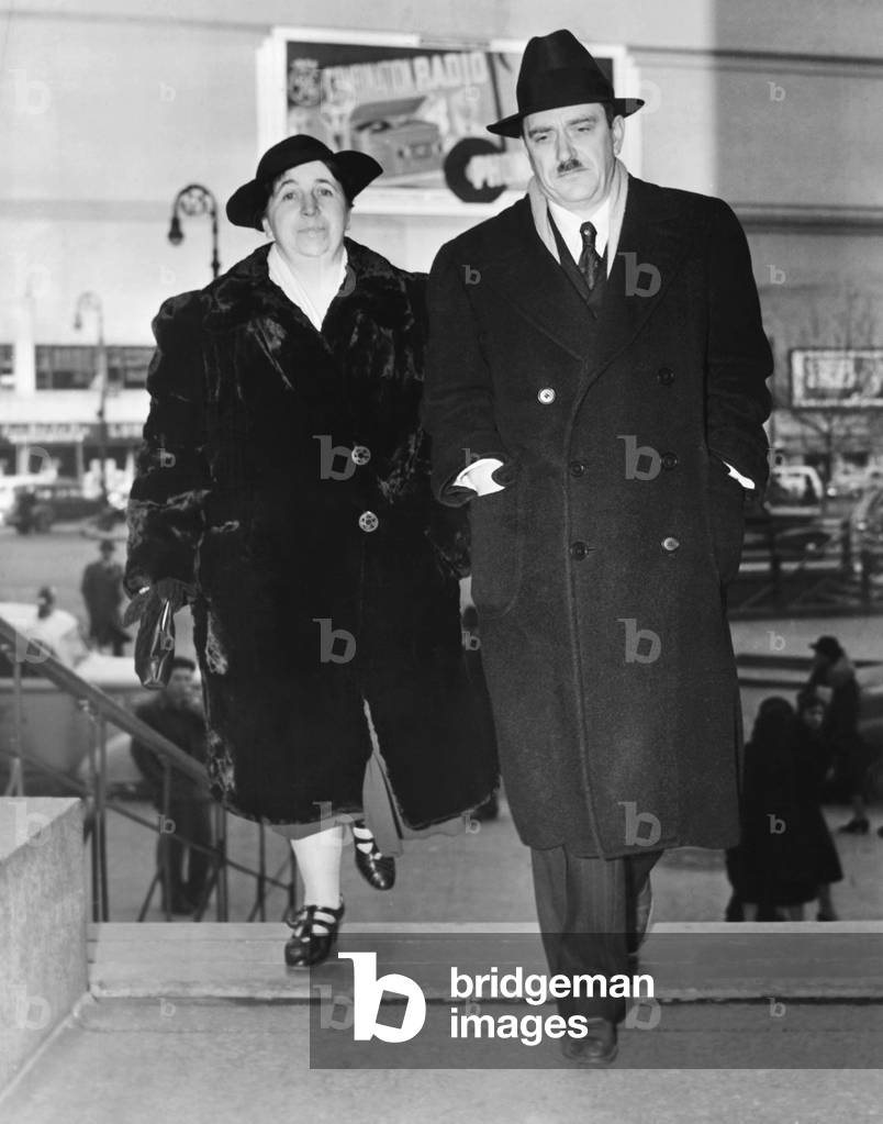 Earl Browder, Chairman of the Communist Party of the U.S. and Elizabeth Flynn, at NYC Federal Court. Dec. 4, 1939. Elizabeth Gurley Flynn, a lifelong leftist activist, was then Secretary of the Committee of Civil Rights for Communists. Browder was facing trial for using false names to obtain State Department passports. He was convicted and eventually served 14 months in prison in 1941-42