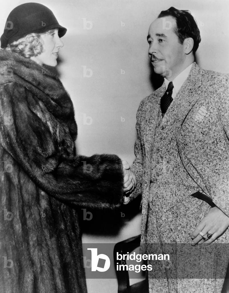 Interracial mariage annulled. Former Ziegfeld Follies star, Actress Helen Lee Worthing and Dr. Eugene Nelson, shaking hands after the annulment proceedings at the Superior Court in Los Angeles, California. Worthing was dropped by the Hollywood studios after she married the African American physician. Jan. 30, 1933