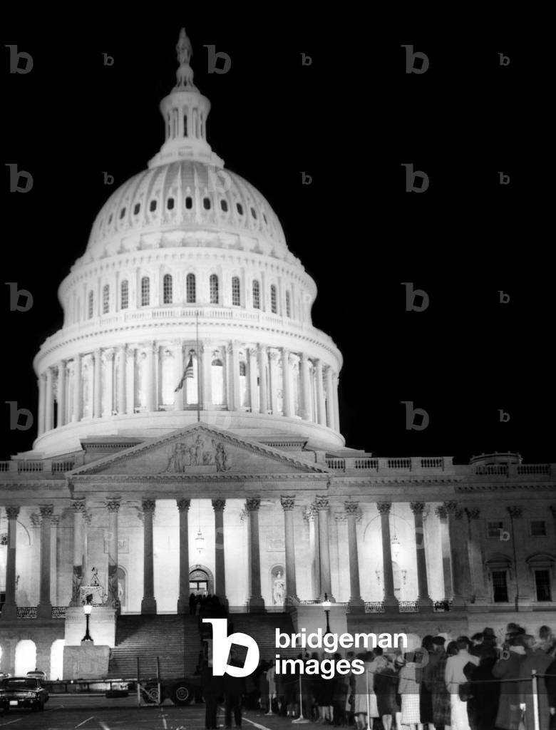 The dome of the U.S. Capitol is illuminated to pay respects to the assassinated President, John F. Kennedy, Washington D.C., November 24, 1963.
