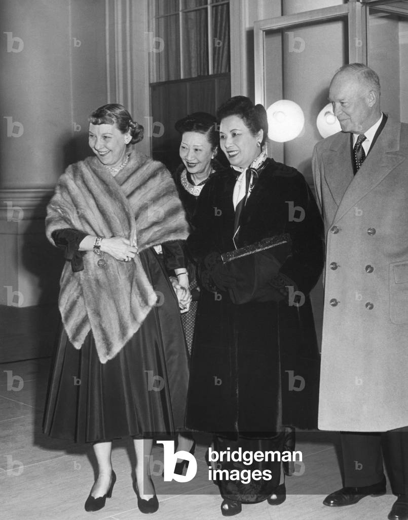 President and First Lady Mamie Eisenhower gave an informal tea for Madame Chiang Kai-shek. Pictured with her is Mrs. Wellingon Koo, wife of the Rep. of China. Ambassador to the U.S. March 9, 1953.