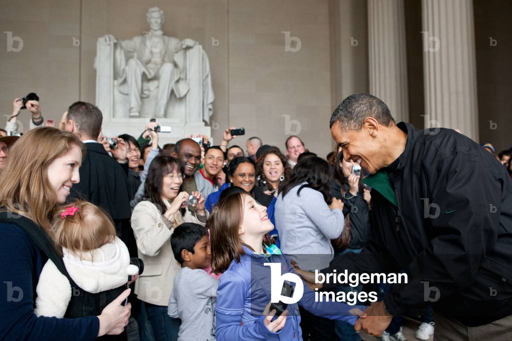 President Obama greets tourists at the Lincoln Memorial to thank them for visiting the Memorial a day after the April 2011 budget fight was resolved keeping US government facilities open. April 9 2011. (BSWH_2011_8_138)