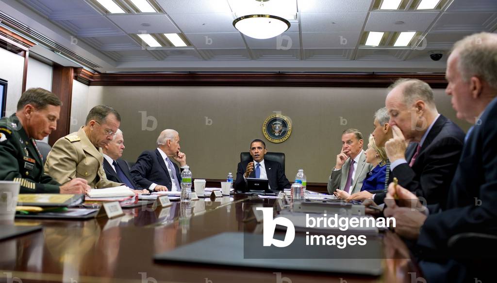 President Obama meets with his national security team on Afghanistan and Pakistan in the Situation Room of the White House June 23 2010. L to R David Petraeus Mike Mullen Robert Gates Joe Biden the President Jim Jones Hillary Clinton Rahm Emanue (BSWH_2011_8_74)