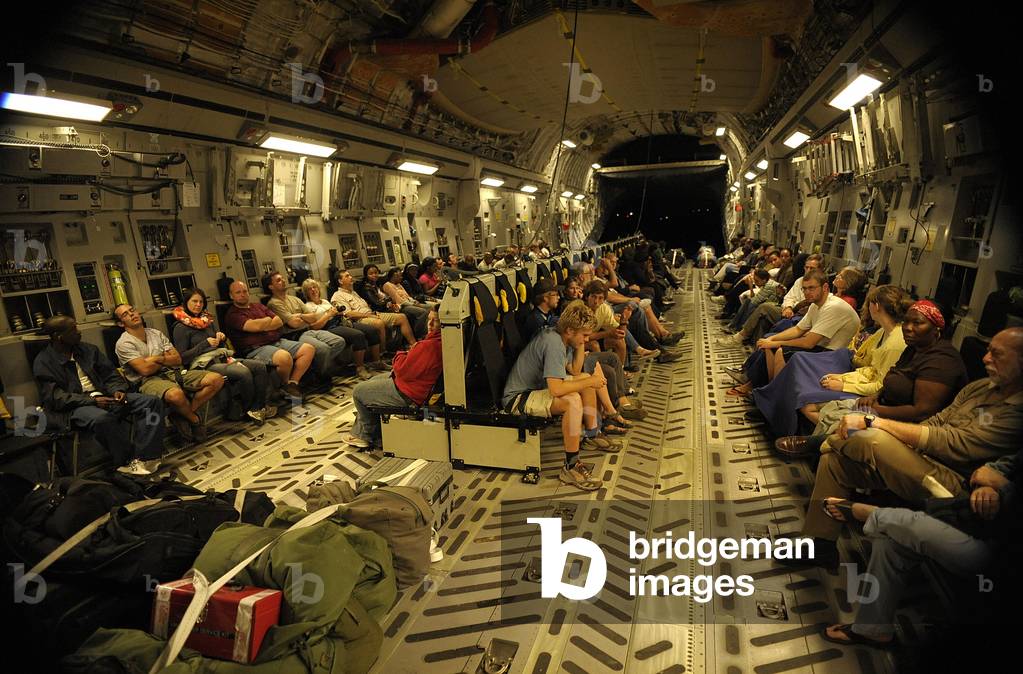 US citizens evacuated from earthquake stricken Haiti in a Air Force C-17 transport. Jan. 15 2010