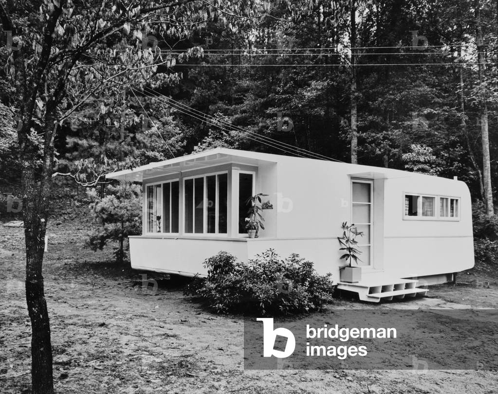 Prefabrication housing developed for TVA (Tennessee Valley Authority's) employees in 1930s. Buildings could be relocated to worksites as needed and were competitive in cost with traditionally constructed housing