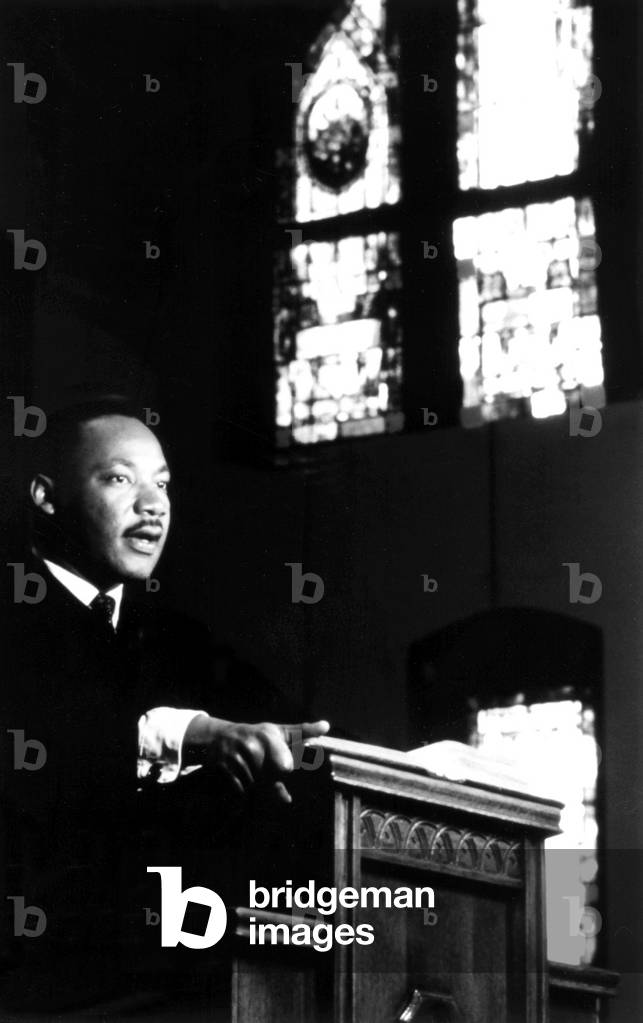 DR. MARTIN LUTHER KING, JR. preaching from his pulpit, 1960s (photo)