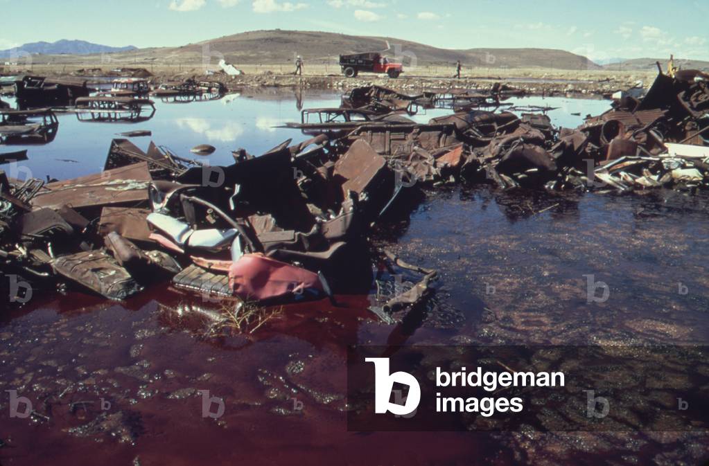 A five acre pond so polluted with junked autos acid and oil it threatened to contaminate the nearby Great Salt Lake and a wildlife refuge. Under EPA supervision the water was removed cleaned and safely disposed. c. 1973-75