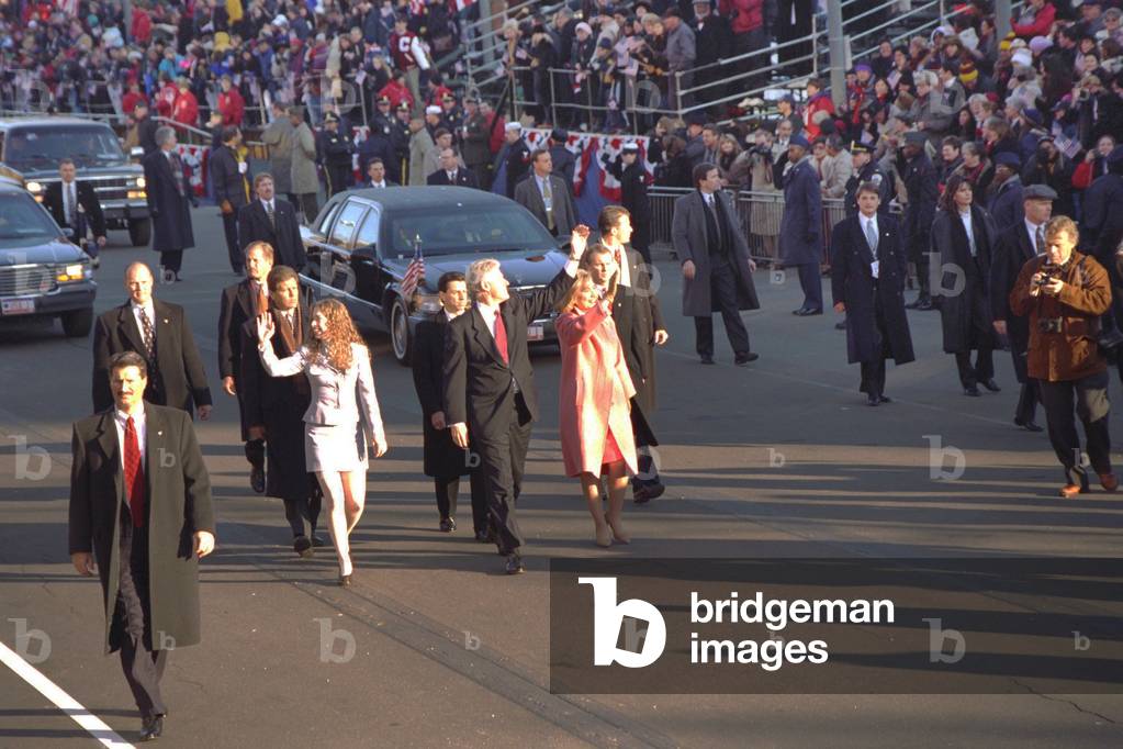 President Bill Clinton walk with Chelsea and Hillary in the 1997 Inaugural Parade