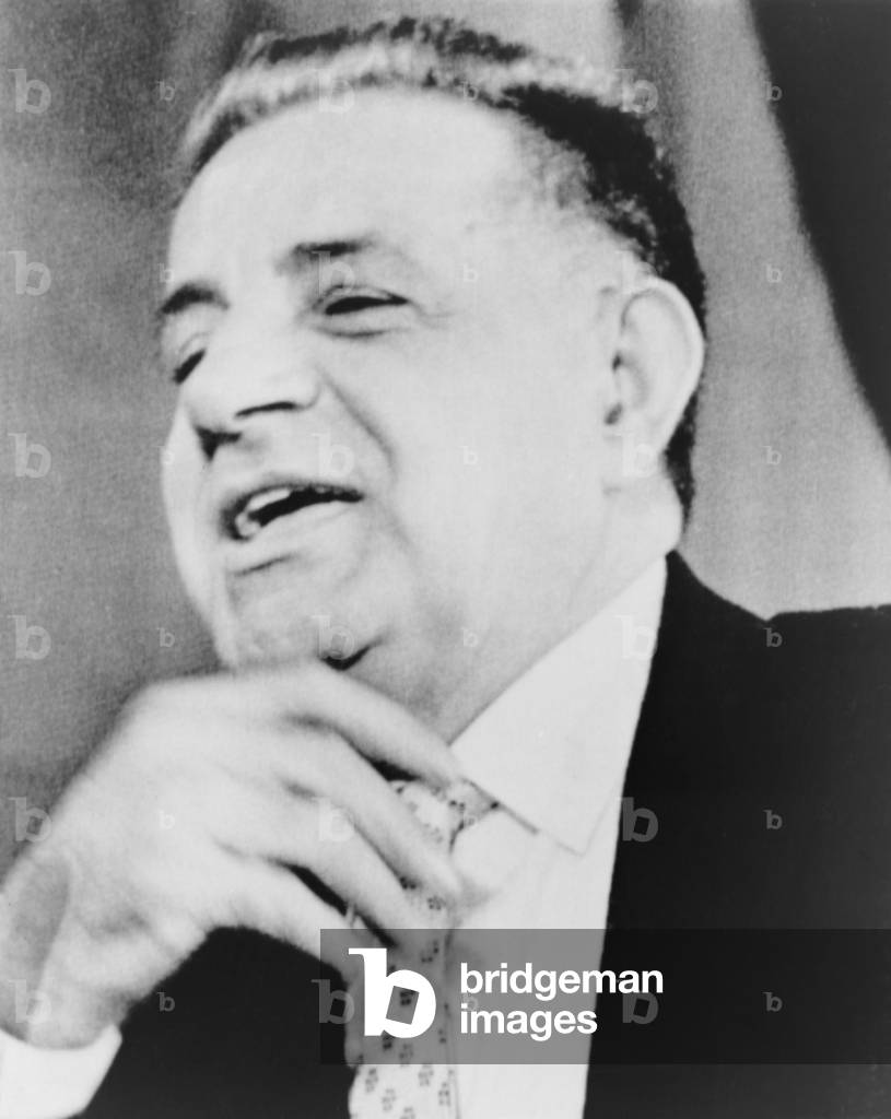 Joseph Valachi, 'singing' during appearance before Senate Investigations subcommittee in 1963. Valachi, a lifelong Mafia insider, provided detailed testimony on Mafia organization, culture, and leaders. Charles Bronson portrayed the gangster in the 1972 movie, THE VALACHI PAPERS