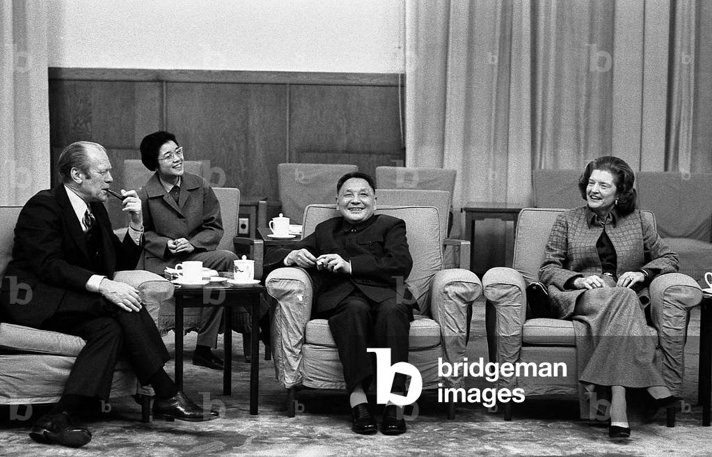 President and Betty Ford Vice Premier Deng Xiao Ping and Deng s interpreter have an informal meeting in Beijing China. Dec 3 1975