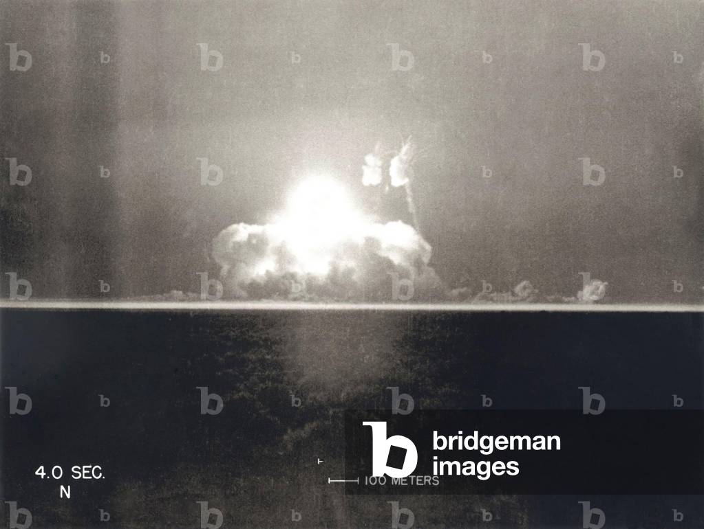 First Atomic Explosion on July 16, 1945. Photograph taken at 4 seconds after the initial Trinity detonation shows the beginning of the Mushroom cloud. Manhattan Project, World War 2. Alamogordo, New Mexico